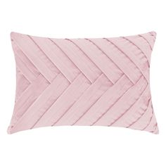 a pink pillow with pleated lines on it