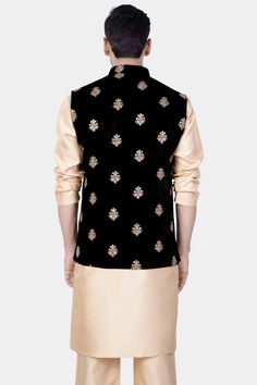 Presenting our Almond Brown Kurta Set paired with a striking Jade Black Designer Velvet Nehru Jacket adorned with intricate sequin and thread embroidery, perfect for weddings, engagements, or any special occasion. This ensemble effortlessly blends elegance with a touch of casual flair, offering a sophisticated yet relaxed look. Elevate your style with this meticulously crafted Kurta Jacket Set, designed to make a statement at any event with its unique fusion of traditional and contemporary elements. Nehru Jacket In addition to being constructed from Imported Superior Fabrics, French crown Nehru jackets are built with top quality components and thoughtful construction. 100% Recycled Polyester Fabric. Features Semi Padded shoulder for a formal silhouette 5-button, single-breasted closure Man Black Fitted Nehru Jacket With Resham Embroidery, Luxury Black Traditional Nehru Jacket, Black Embroidered Fitted Nehru Jacket, Luxury Black Embroidered Nehru Jacket, Luxury Fitted Single-breasted Nehru Jacket, Nehru Jackets, Recycled Polyester Fabric, Mandarin Collar, Black Design