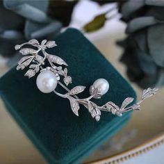 Metal: Sterling Silver Metal purity: 925 Metal Weight: 17-l20 Grams, Approx Stone Used: Moissanite Peal Used: Fresh Water Stone Size: 12mm X 10mm & 10mm X 8mm Dimensions of the item: 71mm X 27mm Elegant Silver Diamond Brooch, Exquisite Sterling Silver Brooch For Formal Occasions, Exquisite Silver Brooch Jewelry, Luxury Sterling Silver Brooches, Wedding Brooches In White Gold And Sterling Silver, White Gold Sterling Silver Brooches For Wedding, Elegant Anniversary Brooch Jewelry, White Gold Sterling Silver Wedding Brooches, Elegant White Gold Round Brooches