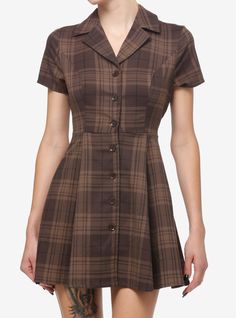 Get ready for fall with a little retro flair! This dress features a brown plaid design  collar and functional buttons down the front. An essential for your autumn cottage wardrobe!Please note: Style is fitted with no stretch; size up for a looser fit.64% polyester; 34% rayon; 2% spandexWash cold; dry lowLength: 31''ImportedListed in junior sizesModel height: 5' 10''Model wears size Small Cottage Wardrobe, Autumn Cottage, Academia Outfits, Get Ready For Fall, Ready For Fall, Brown Plaid, Plaid Design, Sweaters And Jeans, Plaid Dress