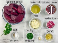 the ingredients for beets are shown in bowls on a marble counter top, including carrots, onions, parsley, garlic and oil