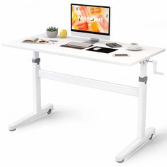 a computer desk with a monitor, keyboard and mouse on it's stand legs