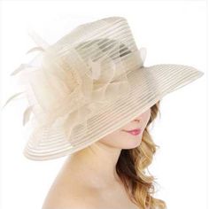 Dress Hat With Bow And Feather Cream Weight 2.6oz Size: Brim 5" X Crown Height 5" X Crown Diameter 7.5" 100% Polyester Elegant Lined Hats For Spring, Elegant Spring Hats With Lining, Elegant Spring Lined Hats, Formal Fedora Hat For Spring, Spring Formal Fedora Hat, Formal Spring Fedora Hat, Spring Beige Hat For Formal Occasions, Spring Formal Beige Hat, Chic Beige Hat For Church