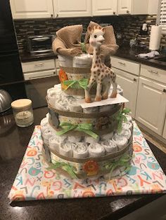 a giraffe cake sitting on top of a kitchen counter