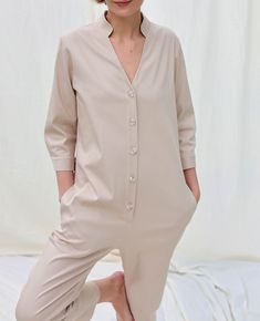 "We believe in handmade! Every piece is dedicated and made to the person who ordered it by using old traditional skills. About the jumpsuit: All our jumpsuits are made based on your height measurements! Jumpsuit made from a soft and stretchy denim fabric. Relaxed/loose fit. Mandarin collar, button closure, 3/4 length sleeves with cuffs and buttons. Elegant and feminine look, perfect for special occasion or to wear it every day. * Handmade in our studio from 98% cotton, 2% spandex. * Relaxed/loos Long Sleeve Denim Jumpsuit, Khaki Jumpsuit, Womens Jumpsuits, Custom Made Clothing, Jeans Jumpsuit, Feminine Look, Denim Jumpsuit, Mandarin Collar, Casual Fits