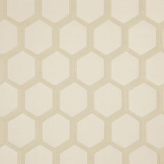 a beige and white wallpaper with hexagonal shapes on it's surface