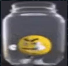 a smiley face drawn on the side of a glass jar