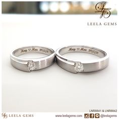 two white gold wedding rings with diamonds on each one and the words, may & june gems