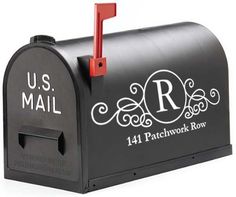 a black mailbox with the word us mail on it