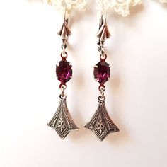 These beautiful delicate earrings breathe style and sophistication and class. I used vintage Swarovski amethyst gems and sterling silver plated intricate drops to create this piece.  The earrings are about 35mm long from the bottom of earwires. Matching locket can be found here - https://www.etsy.com/au/listing/249477197/amethyst-lace-victorian-style-locket?ga_search_query=purple&ref=shop_items_search_2 Elegant Handmade Crystal Earrings For Formal Events, Vintage Lever Back Earrings For Formal Occasions, Elegant Sterling Silver Jewelry With Lever Back, Silver Lever Back Earrings For Wedding, Elegant Amethyst Crystal Earrings For Wedding, Silver French Hook Jewelry For Wedding, Silver Lever Back Earrings For Formal Occasions, Elegant Antique Silver Drop Earrings, Silver Wedding Earrings With Lever Back