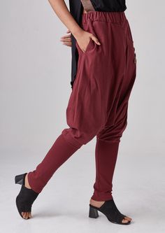 "🚚..ALL ORDERS ARE SHIPPED VIA DHL EXPRESS MAIL Relaxed fit dropped-crotch pants in red. Asymmetric crossover fabric panel at front and back with 3 buttons front detailed. Elastic waistband and two hand pockets at side seam. Roll up the cuffed hem for an utlra relaxed look! * Pull-on style * Drop-crotch style * 2\" Elastic waistband * Side seam pockets * Wide cuffed hem Measurements approximately: Waist : 26\" (66 cm) stretching to 48\" (122 cm)-elastic material Hips : 50\" (122 cm) Outseam: 38 Drop Crotch Pants, Long Maxi Skirts, Fabric Panels, Parachute Pants, Harem Pants, Trousers, Relaxed Fit, Pants, Red