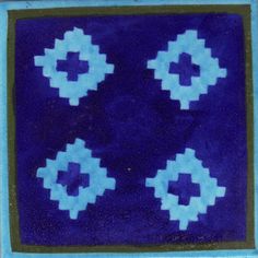 a blue and black square with squares on it