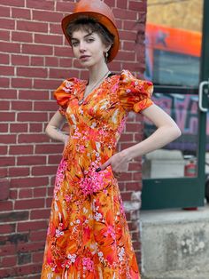 "Extreme Bight Mood Puff Sleeve 70s Hawaiian Print Orange and Pink Spring Maxi Dress. Here comes the sun. In excellent condition with no flaws of note. No tags. Feels synthetic. Back vinyl zip with hook and eye at neck. So beautiful Bust 31\" Waist 24\" Hip 36\" Length 49\" Please message me with questions before purchasing. All sales are final and ship fast from the Vermont shop. Find us on Instagram @anasclosetfullofcolor Thankyou! More vintage dresses here: https://www.etsy.com/shop/anastasia Retro Dresses With Vibrant Print For Vacation, Hawaiian Fitted Short Sleeve Dress, Vintage A-line Dress For Vacation, Vintage A-line Vacation Dresses, Hawaiian Short Sleeve Spring Dresses, Retro Summer Dresses With Tropical Print, Retro Tropical Print Dress For Vacation, Retro Tropical Print Vacation Dress, Summer Retro Dresses With Tropical Print