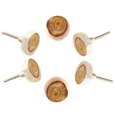 four wooden knobs are arranged in a circle