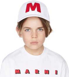 Gabardine cap in white featuring logo graphic embroidered in red at face. Logo embroidered in black at back face. · Curved brim · Embroidered eyelets at crown · Adjustable cinch strap at back face · Partially lined · Hand wash Supplier color: White Marni Size: Recommended Age 1: 3-6M 2: 9-12M 3: 18-24M | Marni Kids White Logo Cap White Baseball Cap With Logo Print And Curved Brim, White Letter Print Visor Snapback Hat, White Letter Print Snapback Visor Hat, White Snapback Visor Hat With Letter Print, White Baseball Cap With Logo Print And Curved Visor, White Baseball Cap With Logo Print, White Baseball Cap With Logo And Curved Visor, White Hat With Letter Patch For Streetwear, White Letter Patch Hat For Streetwear