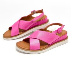 These leather sandals are both comfortable and cute with a buckled backstrap and a cushioned footbed. From Miz Mooz. Pink Slingback Sandals With Buckle Closure For Summer, Pink Leather Sandals With Adjustable Strap, Pink Leather Footbed Sandals With Removable Insole, Pink Slingback Sandals With Buckle Closure, Summer Leather Footbed Sandals With Adjustable Strap, Spring Footbed Sandals With Adjustable Single Toe Strap, Spring Footbed Sandals With Adjustable Straps, Pink Slingback Sandals With Adjustable Strap, Spring Double Strap Slingback Sandals With Leather Footbed