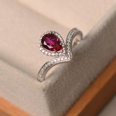 Elegant Teardrop Ruby Rings, Elegant Red Pear-shaped Rings, Elegant Pear-shaped Red Rings, Elegant Pear-shaped Ruby Promise Ring, Pear-shaped Ruby Rings, Red Teardrop Ruby Rings, Fine Jewelry Red Teardrop Ruby Ring, Classic Red Teardrop Ring, Teardrop Ruby Ring For Anniversary