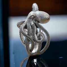 Make a bold and unforgettable statement with this Octopus Tentacle Engagement Ring, exquisitely crafted from 925 sterling silver. This unique ring features the intricate, lifelike design of an octopus tentacle, symbolizing strength, adaptability, and the mysterious beauty of the ocean. Perfect for those who seek a non-traditional engagement ring, this piece combines nautical themes with a touch of gothic elegance, making it a standout choice for those who appreciate unique and meaningful jewelry Silver Rings Men, Octopus Head, Octopus Animal, Tentacles Ring, Sea Rings, Walking Staff, Octopus Jewelry, Octopus Ring, Jewelry Manufacturing