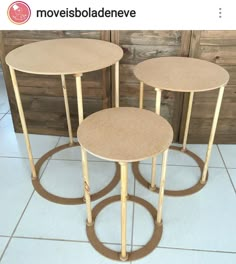 three tables sitting on top of a white tile floor