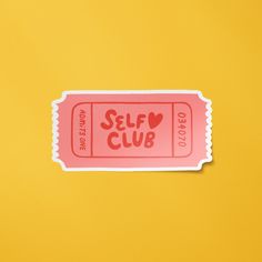 a pink sticker with the words self club written on it, against a yellow background