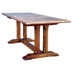 a wooden table with two legs and one leg extended to the side, on an isolated white background