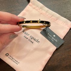 Nwt Kate Spade Gold And Black Bangle Bracelet No Flaws And Still In Original Packaging! Dust Bag Included! Bangle Clasp Fully Opens Kate Spade Bangle Bracelet, Kate Spade Jewelry Aesthetic, Kate Spade Bangle Bracelets For Party, Kate Spade Gold Bracelets, Chic Kate Spade Bangle Bracelet, Chic Kate Spade Gold Bracelets, Chic Gold Kate Spade Bracelets, Kate Spade Elegant Black Jewelry, Elegant Black Kate Spade Jewelry