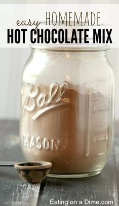 homemade hot chocolate mix in a mason jar with spoon on the side and text overlay that reads easy homemade hot chocolate mix