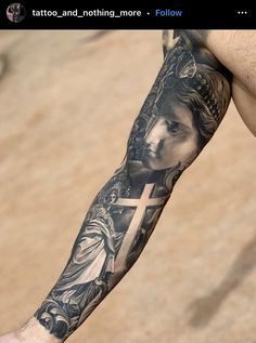 a man with a cross tattoo on his arm