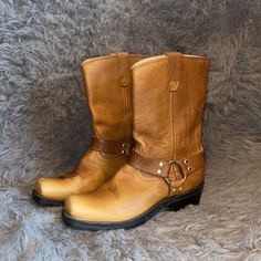 Durango Utilized Hardy Brown Leather On The Upper To Create A Classic-Looking Harness Boot. The Exterior On This 10" Boot Was Kept Very Minimal, Therefore This Boot Can Look Good With Anything From Jeans To A Free-Spirited Dress. Soft, Smooth-Textured Leather Has Been Added To The Interior To Make These Brown Boots Superbly Comfortable. There Is Also An Insole That Supplies Just The Right Amount Of Cushioning To Keep Your Feet At Ease. Durango Boots, Harness Boots, Shoes Vintage, Camel Color, Free Spirited, Vintage Shoes, Brown Boots, Bootie Boots, Brown Leather