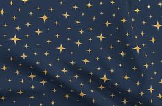 a dark blue background with gold stars