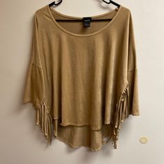 Western Cuteness Size Large Higher Front And Longer Back With Short Sleeves Preloved Excellent Condition As If Never Worn Suede Like Material 92%Polyester 8% Spandex Summer Stretch Fringe Tops, Long Sleeve Fringe Tops For Summer, Casual Long Sleeve Top With Fringe, Trendy Fringe Short Sleeve T-shirt, Bohemian Washed Short Sleeve T-shirt, Cheap Western Style Short Sleeve T-shirt, Trendy Short Sleeve Rodeo T-shirt, Short Sleeve Graphic Print T-shirt For Rodeo, Black Mesh Top