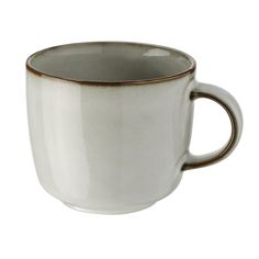 a white coffee cup with brown rim