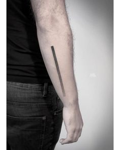 a man's arm with a knife tattoo on the left side of his arm