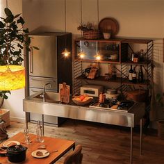 the kitchen is clean and ready to be used for dinner or wine tasting in someone's home