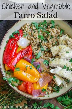 chicken and vegetable farro salad in a bowl