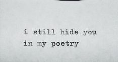 an old typewriter with the words i still hide you in my poetry