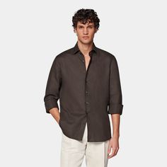 This breezy dark brown button-up shirt is tailored slim with soft collar interlining, a sleek French placket, and a slightly curved hem that makes it perfect for casually wearing untucked. Elegant Brown Business Tops, Elegant Brown Business Top, Brown Relaxed Fit Shirt For Work, Brown Spread Collar Tops For Work, Formal Brown Button-up Shirt, Formal Brown Tops With Button Cuffs, Formal Brown Top With Button Cuffs, Brown Formal Top With Button Cuffs, Brown Slim Fit Button-up Shirt