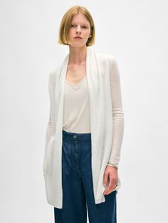 The longest-running piece at White + Warren, the Cashmere Trapeze Cardigan is a chic fingertip-length open sweater that works on every body type. No matter what color you choose, you'll want to wear this timeless style season after season. Details Straight fit. Long sleeve. Length in size small is 32.5" The model is 5'11" and is wearing a size small. 100% Cashmere. Hand wash cold or dry clean. Do not twist or wring. Reshape and lay flat to dry. Warm iron if needed. Style #11092 Open Sweater, No Matter What, Womens Cardigan, You Choose, Timeless Style, Body Types, Amazing Women, Timeless Fashion, Ready To Wear