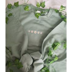 Embroidered Daises Sweatshirt, Embroidered Floral Sweatshirt, Flower Sweatshirt, Plant Lady Gift, Plant Sweatshirt, Floral Shirt, Floral Gift Material: 80% ring spun, combed cotton (softest, most durable and most environmentally friendly cotton around 20% polyester. This sweatshirt features super high quality embroidery, meaning your sweatshirt will last wash after wash. This way you can wear it as many times as you wish and reduce wastage at the same time.. Soft cotton faced fabric. Stylish fit and lining. Set-in sleeves. Taped neck. Ribbed collar cuffs and hem. Twin needle stitching. Worldwide Responsible Accredited Production (WRAP) certified production. Supersoft brushed inner fabric. Fit: Slightly oversized, stylish fit. Model wears a size S The embroidery on this sweatshirt can be ap Minimalist Embroidered Sweatshirt, Embroidered Cotton Crew Top, Green Long Sleeve T-shirt With Custom Embroidery, Green Cotton Tops With Machine Embroidery, Green Embroidered Long Sleeve Sweatshirt, Green Embroidered Crew Top, Green Embroidered Crew Neck Top, Green Embroidered Long Sleeve T-shirt, Crew Cotton Top With Machine Embroidery