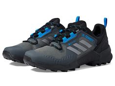 adidas Outdoor Terrex Swift R3 GORE-TEX(r) Hiking Shoes - Men's Shoes : Black/Grey/Blue Rush : The adidas Outdoor Terrex Swift R3 GORE-TEX Hiking Shoes with a waterproof GORE-TEX membrane combine the lightweight design and cushioning of a trail running shoe with the versatility and stability of a hiking boot. Traditional lace-up closure for a secure fit. GORE-TEX textile upper. Water-resistant and breathable. Lightstrike EVA midsole. Textile lining and molded sockliner. Continental Rubber outsol Sporty Impact Resistant Trail Running Shoes, Adidas Functional Trail Running Shoes, Impact Resistant Sporty Sneakers For Hiking, Sporty Impact-resistant Hiking Sneakers, Sporty Impact Resistant Sneakers For Hiking, Sporty Impact-resistant Hiking Running Shoes, Gore-tex Trail Running Shoes With Boost Midsole For Streetwear, Sporty Impact Resistant Running Shoes For Hiking, Sporty Impact Resistant Hiking Boots