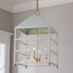 a light fixture hanging from the ceiling in a room