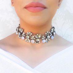 On trend unique rhinestone encrusted choker necklace perfect for someone looking for the perfect glamorous accessory. Luxury antique gold fully embellished white and clear rhinestone statement choker, it arrives with chain allowing it to be adjusted for comfort. Arrives gift-wrapped in elegant branded Gift Box.Material: Zinc Alloy / Rhinestones Size: L30cm / W3.5cm including adjustable chain Clear Necklace, Women Choker Necklace, Evening Jewelry, Family Tree Necklace, Rhinestone Choker Necklace, Black Jewel, Crystal Choker Necklace, Fancy Earrings, Statement Choker