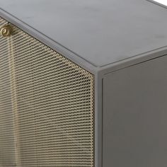 a close up of a metal cabinet on a white background