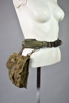 Post Apocalyptic Belt Bag - Tactical Hip Sachet - Handmade Belt Pouch - Distressed - Utility Hip Bag - LARP Accessory - Postapoc Equipment Belt with hip sachet. Made of strong military materials, it will be perfect for everyday use, festivals and survival trips. in a handy bag you can hide the most important things, the strap is also equipped with additional D-rings to which you can attach other equipment. SIZE: For perfectly fitted belt bags, please provide us with your measurements: C - hip circumference Please Note: The product seen on the pictures is a representative of the style. Individual bags may look slightly different than the presented prototype. If you are interested in a custom order, or want us to modify the design for you - contact us. More clothes: https://www.etsy.com/shop Fantasy Bag Belt, Interesting Bags Design, Distressed Clothing Post Apocalyptic, Post Apocalyptic Backpack, Dystopian Accessories, Zombie Apocalypse Oc Art, Apocalypse Accessories, Post Apocalyptic Outfit Women, Apocalypse Aesthetic Clothes