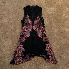 Beautiful High Necked Black Lace Neck With Floral Accents Dress. Super Light Weight And Flowing Material Also In Perfect Condition. Nwt And Never Been Worn, I Would Recommend Wearing A Bralette Underneath Because The Lace Goes Very Low. Black Bohemian Mini Dress With Floral Print, Bohemian Black Mini Dress With Floral Print, Black Sleeveless Bohemian Mini Dress, Taupe Midi Dress, Black Lace Overlay Dress, Peasant Style Dress, Tunic Shirt Dress, Free People Mini Dress, Lace Overlay Dress