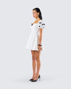 When you’re a sweetheart with a baddie side 😙 This white skater mini dress is made from crepe fabric and complete with mini black velvet bow details, puff sleeves, and a built-in corset for a look that gives the best of both worlds 🖤 Skater Mini Dress, Black Velvet Bow, Black Off Shoulder, Mini Skater Dress, Best Of Both Worlds, Graphic Top, White Jersey, Velvet Bow, Pocket Pants