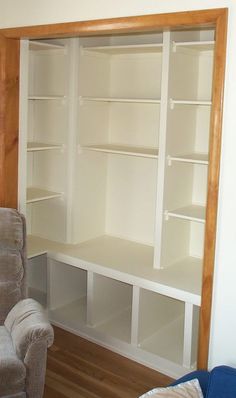 a living room with a couch and bookcases