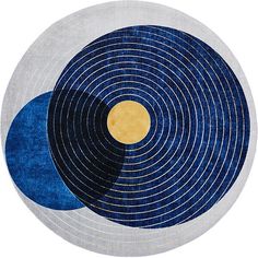 a round rug with blue and yellow circles on the center, in front of a white background