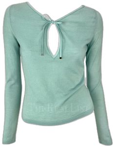 Luxury V-neck Top For Spring, Luxury Spring Tops, Designer Long Sleeve Cashmere Tops, Elegant Spring Cashmere Top, Luxury Cashmere Tops, Luxury Fitted Cashmere Tops, Luxury Formal Cashmere Tops, Luxury Cashmere Tops For Formal Occasions, Light Blue Fine Knit Top For Spring