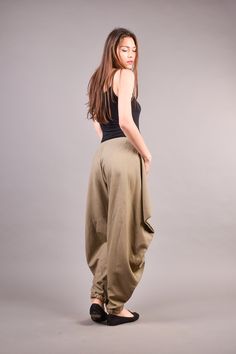 "Linen Harem Pants, Harem Trousers, Baggy Pants, Loose Pants. Extravagant harem trousers with interesting and unusual cut. The baggy pants are loose fit and feature drop crotch. The model is made of linen fabric so it is extremely comfortable women pants suitable for the daytime. If you are looking for the perfect addition to your casual outfit these loose pants are a great choice matched with flats or sneakers. ^ Sizes: The item can be made in sizes from XXS to 7XL. Please, use the size chart b Linen Harem Pants, Black Harem Pants, Maxi Pants, Harem Trousers, Baggy Pants, Drop Crotch Pants, Boho Pants, Baggy Pant, Loose Pants